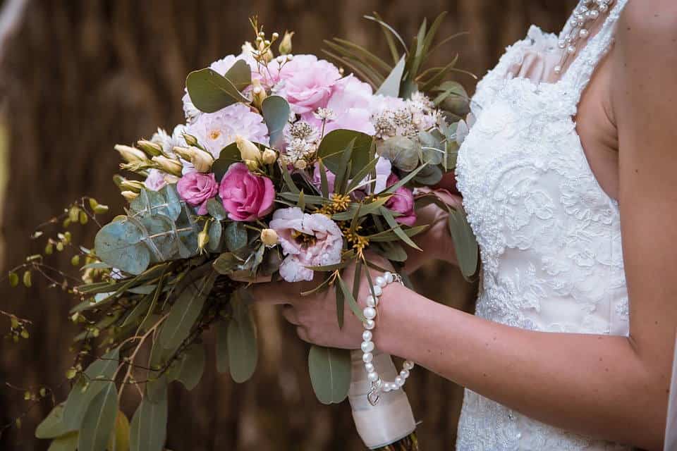 boho bride with flowers